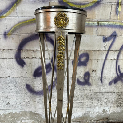 $250 marble topped metal pedestal	
