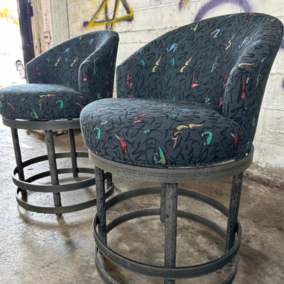$150 custom upholstered top steel base swivel stools	