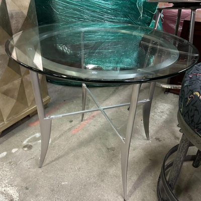 $120 glass topped table	