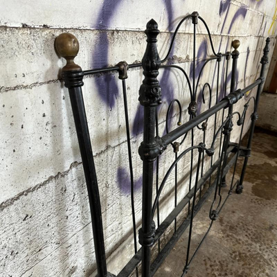 $100 antique iron bed	