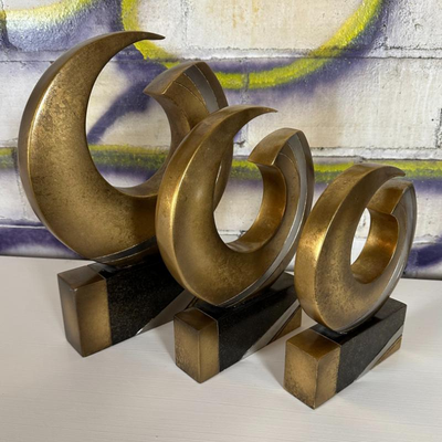 $120 set of three decorative sculptures	