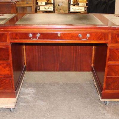 173: Contemporary mahogany 3 part leather top executive desk with key approx. 74
