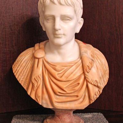 109: Italian carved tri color marble bust of Young Roman man, base has been repaired approx. 17