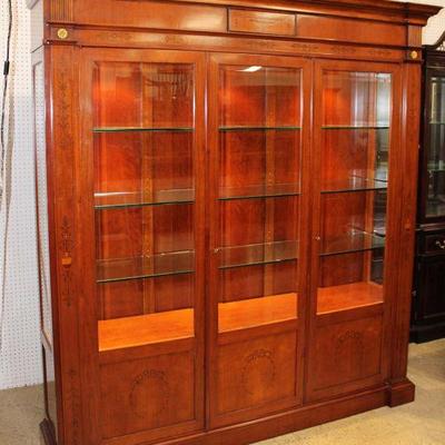 205: Italian mahogany with inlay 3 door lighted display cabinet with bevel glass doors and keys, originally purchased from Bloomingdales...