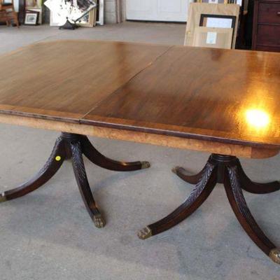 277: Antique mahogany banded dining room table with (2) 18" leaves approx. 72" w x 48" d x 28" h