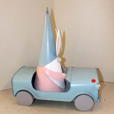 353: Metal jeep with metal rabbit driving approx. 9" w x 16" d x 19" h