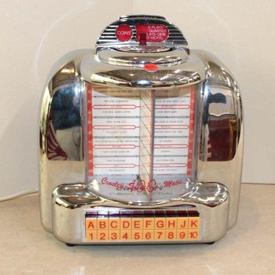 344: Working Vintage Collector Edition Crosley Jukebox style table top radio with cassette player approx. 12" w x 6" d x...