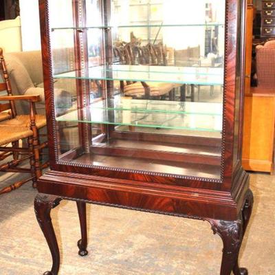 150: Quality semi antique burl mahogany slide door display case with glass shelves and keys approx. 32