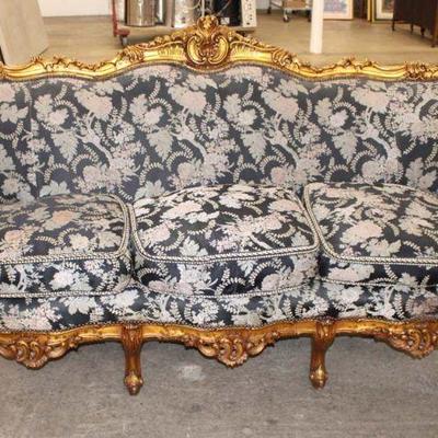 135: Highly carved French style parlor sofa in the gold frame approx. 80