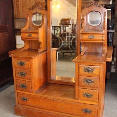 297: Antique continental drop center dresser with swivel mirror approx. 44" w x 19" d x 65" h
