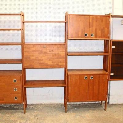 213: Mid century modern Danish modern teak 4 part modular wall unit approx. each section measures 30" w x 16" d x 74" h