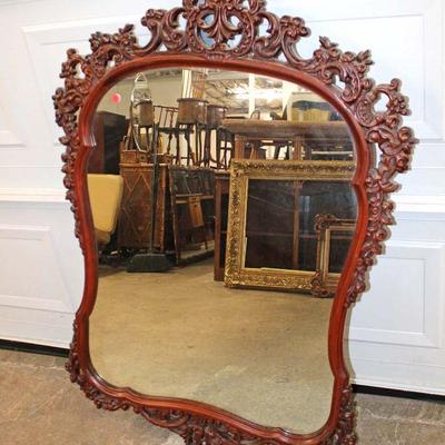201: Vintage highly carved and ornate mahogany decorator mirror approx. 35" w x 49" h