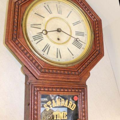 350: Antique Gilbert regulator clock in oak case with key and pendulum approx. 18" w x 5" d x 28" h