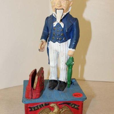 354: Uncle Sam mechanical cast iron bank approx. 5" w x 4" d x 11" h