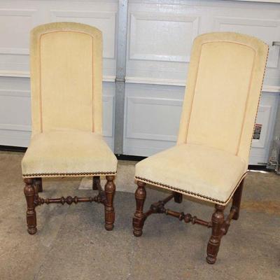 219: Pair of high back upholstered and tacked occasional chairs on oak frame, need to be cleaned approx. 19" w x 20" d x...