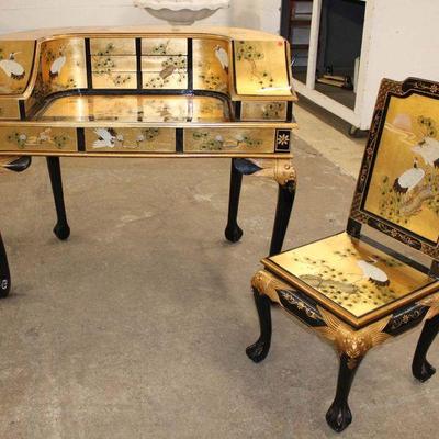 128: 2pc Carlton style desk and chair in the Asian black and gold decoration approx. Desk: 48