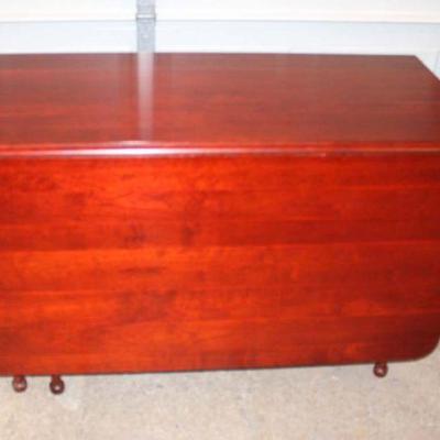 262: Solid cherry drop side gate leg breakfast table approx. Closed: 46" w x 22" d x 30" h Open: 70" w x 46" d x...