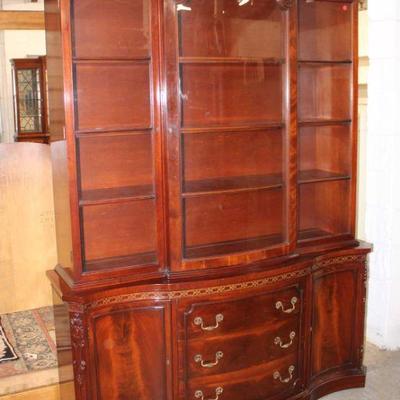 183: Vintage burl mahogany 2pc 1 door bow front Chippendale style china cabinet by John Stewart approx. 60
