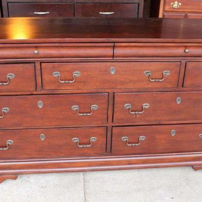 299: Contemporary mahogany finish 9 drawer low chest approx. 65" w x 18" d x 36" h