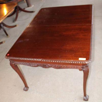 278: Semi antique solid mahogany Chippendale style dining room table with (3) 12" leaves in the manner of Feldenkreis approx....