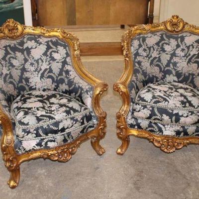 134: Pair of highly carved French style parlor chairs in the gold frame approx. 36