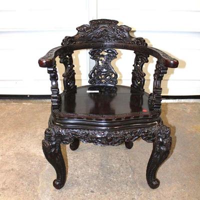 250: Antique Asian highly carved hardwood chair with dragons in as found condition, has age cracks approx. 24" w x 20" d x...