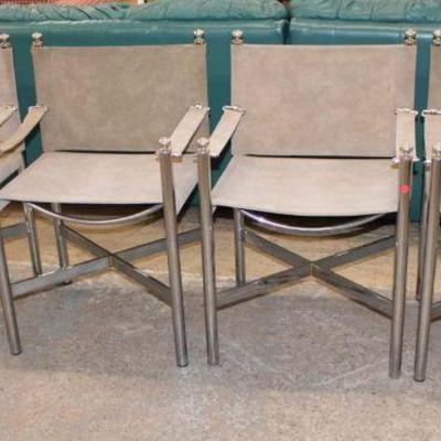 203: Set of 4 mid century modern leather and chrome arm chairs in the manner of Milo Baughman approx. 22" w x 19" d x 32"...