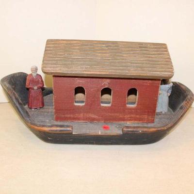 337: Hand carved model of Noah's Ark with 2 figures approx. 21" w x 12" d x 11" j