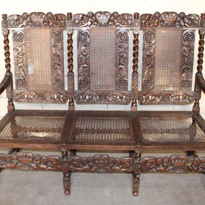 206: Antique highly carved and ornate oak frame cane back and bottom settee, needs to be recained approx. 61" w x 23" d x...