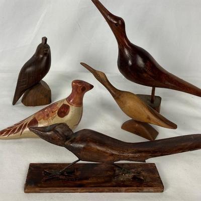 Four Carved Wood Birds and One Clay Bird Figurine