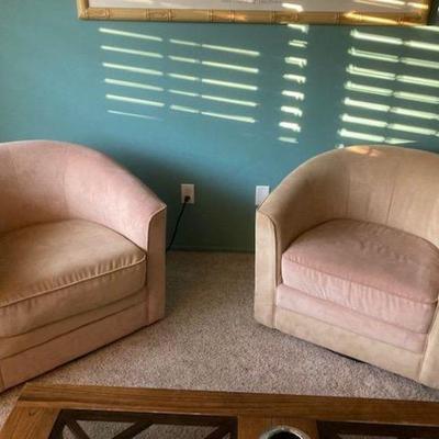 pair of swivel chairs