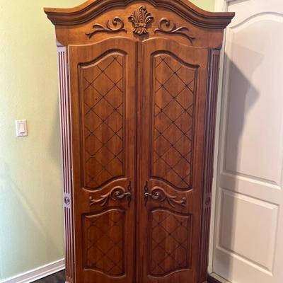 Currently use as a television armoire it is 78 1/2 tall 40 wide and 20 deep