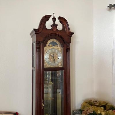 Grandfather clock is 86, tall 22 1/4 wide and 12 3/4 deep