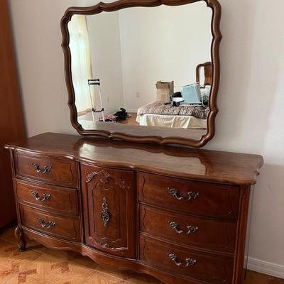 This vintage Bassett dresser is 64, long 18, deep 32 tall with the mirror goes to 67 tall
