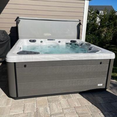 The jacuzzi is the only item available for pre-sale in this estate sale. The approximate dimensions for this Twilight series TS 8.2...