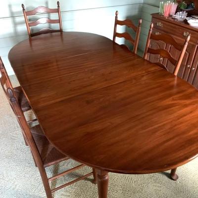 Henkel-Harris solid black cherry dining table with 2 leaves and pads.