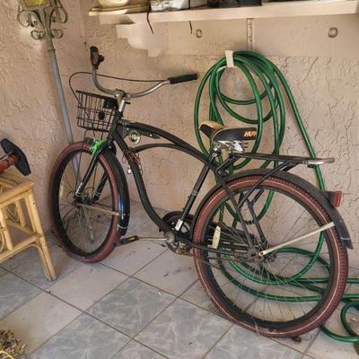 Older bicycle, garden hose air pump