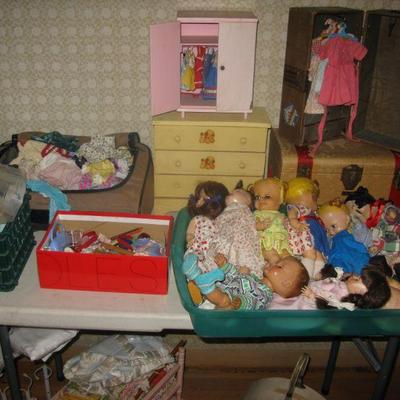 lots of vintage dolls, trunks, chests, chairs, clothes to choose from