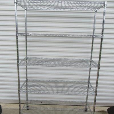 CHROME METRO STORAGE RACK WITH CASTERS MEASURES 47â€ X 18â€ X 76â€ CONTENTS NOT INCLUDED
