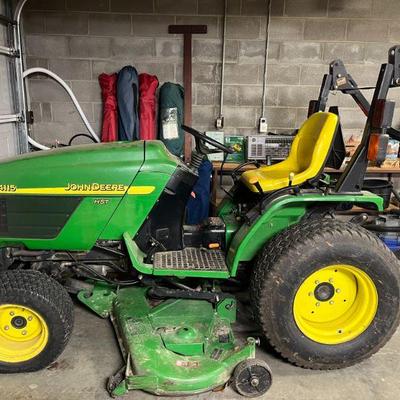 John Deere 4115 HST with 1,858 hours on it.