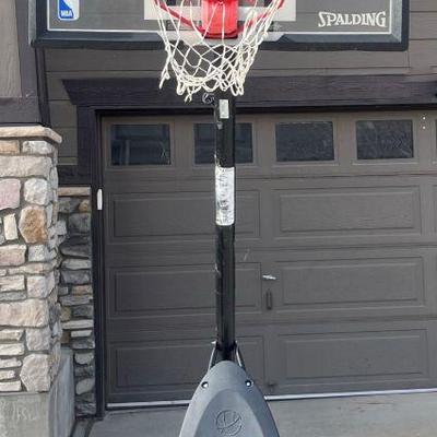Spalding 54 In. Shatter-proof Polycarbonate Exacta Height Portable Basketball Hoop