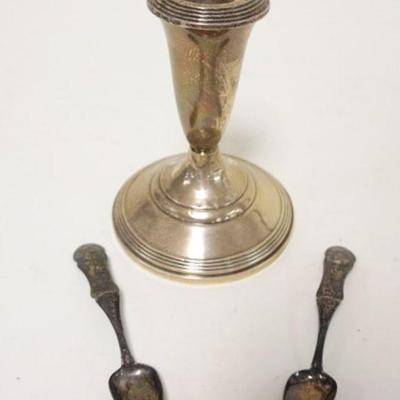 1129	STERLING WEIGHTED 5 1/2 IN CANDLESTICKS AND 2 SILVER SPOONS
