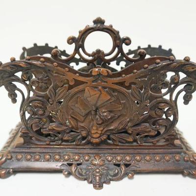 1064	ORNATE BRASS LETTER HOLDER, APPROXIMATELY 5 IN X 9 IN X 7 IN HIGH
