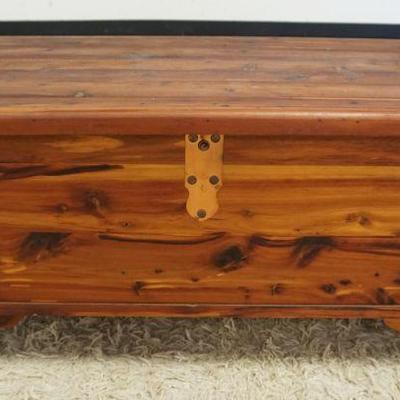 1233	SOLID CEDAR CHEST, APPROXIMATELY 36 IN X 16 IN X 17 IN H
