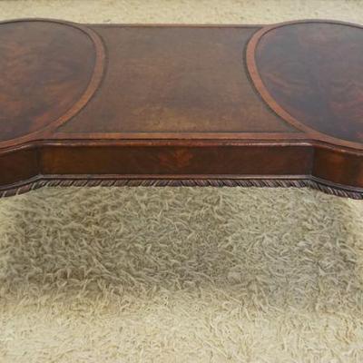 1222	CARVED MAHOGANY COFFEE TABLE WITH BURLED MEDALLION TOP AND LEAHTER CENTER, APPROXIMATELY 40 IN X 22 X 18 INH
