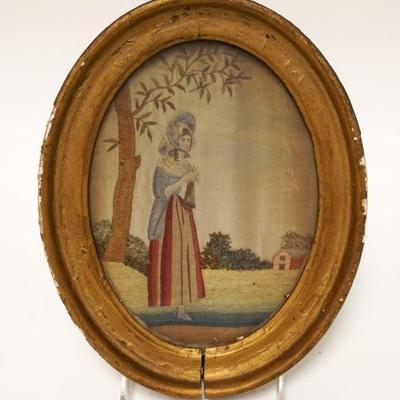 1002	ANTIQUE SILK EMBROIDERY OF A COLONIAL WOMAN IN A RED, WHITE, & BLUE DRESS STANDING IN A FIELD W/TREES & BUILDING IN BACKGROUND,...