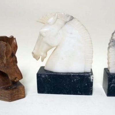 1122	CARVED MARBLE AND CARVED WOOD HORSE HEAD BOOKENDS, LARGEST APPROXIMATELY 6 IN X 3 IN X 9 IN H

