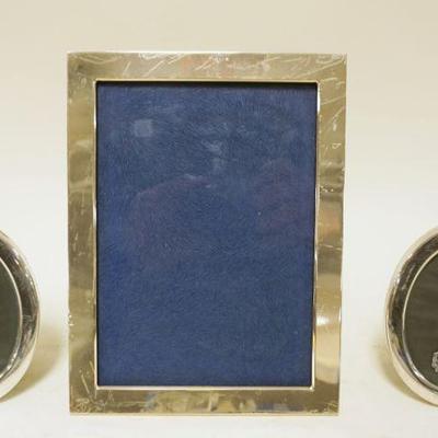 1287	3 SILVER HALLMARKED FRAMES, LARGEST APPROXIMATELY 6 1/4 IN X 8 1/4
