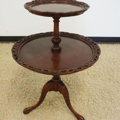 1220	MAHOGANY 2 TIER TABLE WITH PIERCED EDGES, APPROXIMATELY 24 IN X 33 IN H 
