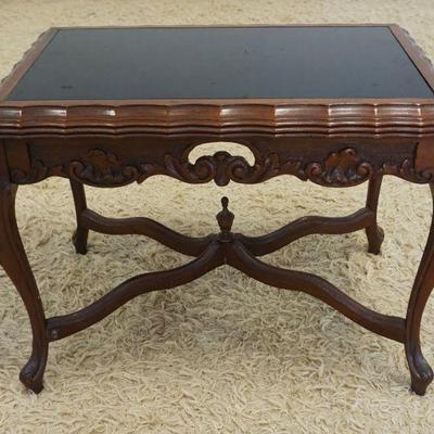 1221	CARVED WALNUT STAND WITH INSET BLACK GLASS TOP, APPROXIMATELY 25 IN X 16 IN X 19 IN H
